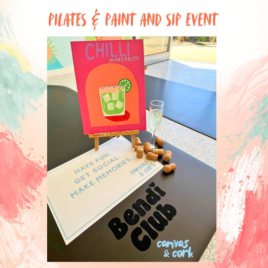 Promotional image for a Pilates & Paint and Sip event with a painting of a margarita, a glass of champagne, and a sign on a table.